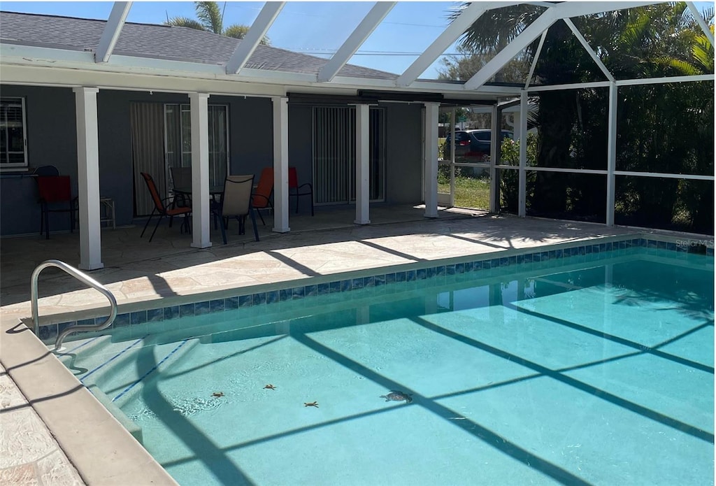 pool featuring a patio area and a lanai