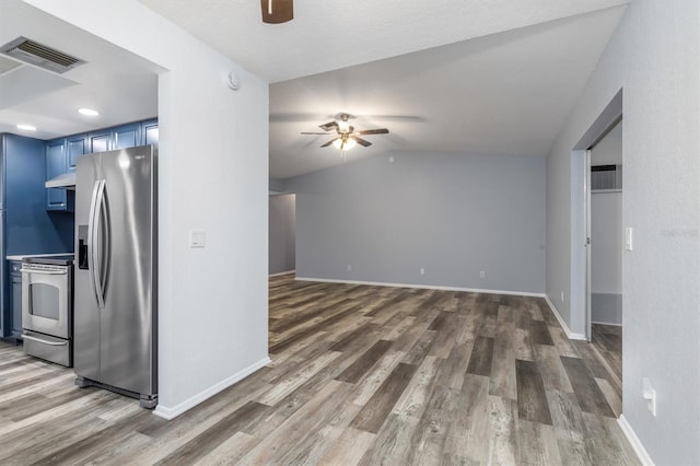 kitchen featuring ceiling fan, blue cabinets, visible vents, and stainless steel appliances