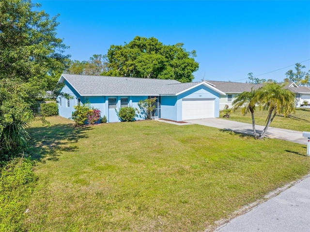 single story home featuring a front yard, an attached garage, driveway, and stucco siding