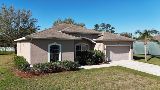 single story home featuring stucco siding, a front lawn, concrete driveway, an attached garage, and a shingled roof