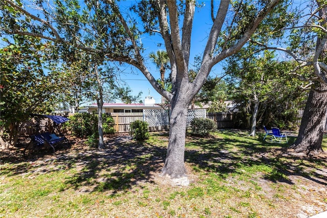 view of yard featuring fence