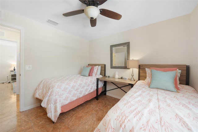 bedroom featuring visible vents, ceiling fan, and baseboards