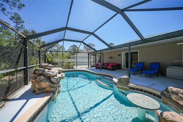 pool with an outdoor living space, a lanai, and a patio area