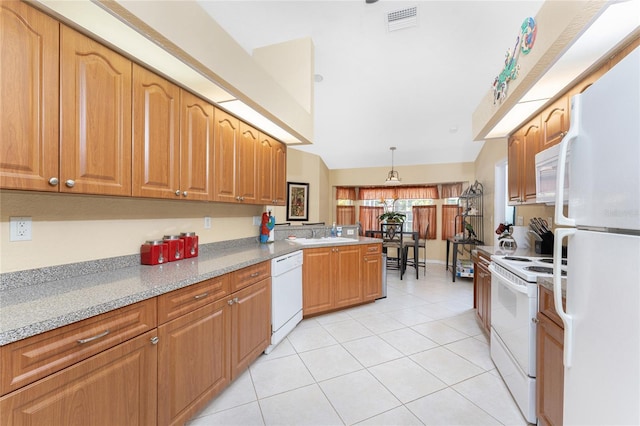 kitchen featuring white appliances, light tile patterned floors, visible vents, a peninsula, and decorative light fixtures