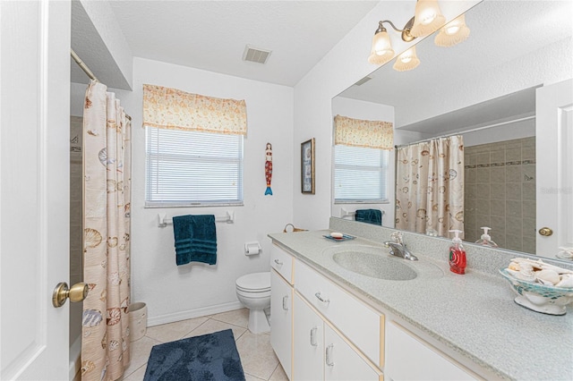 bathroom with tile patterned flooring, visible vents, baseboards, toilet, and vanity