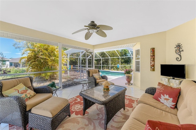 sunroom featuring a ceiling fan