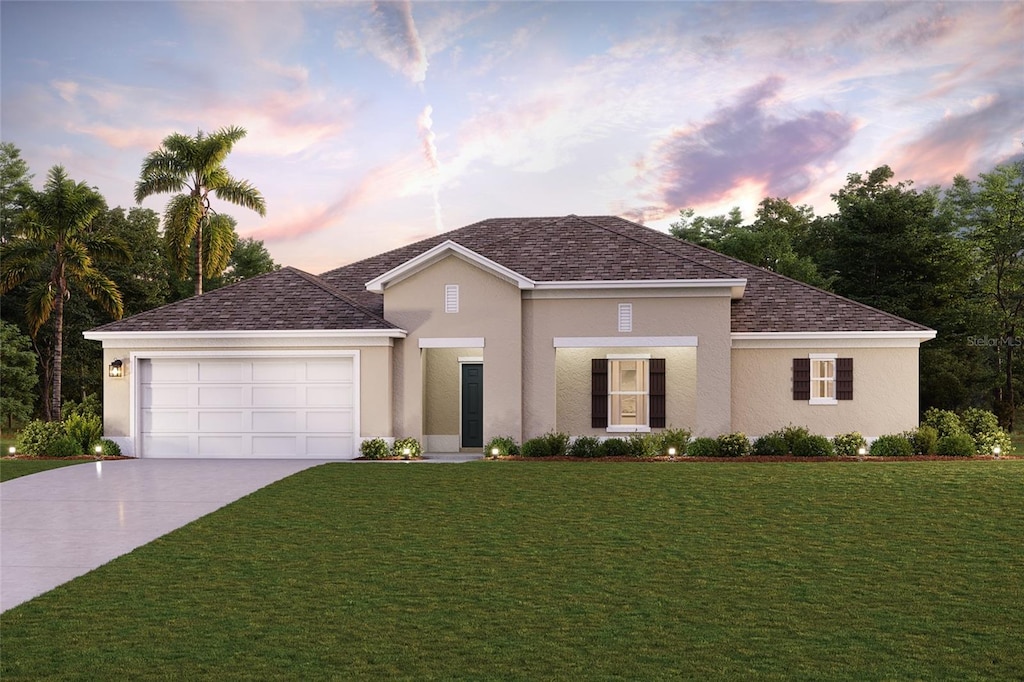 view of front of house featuring driveway, a yard, a shingled roof, stucco siding, and a garage