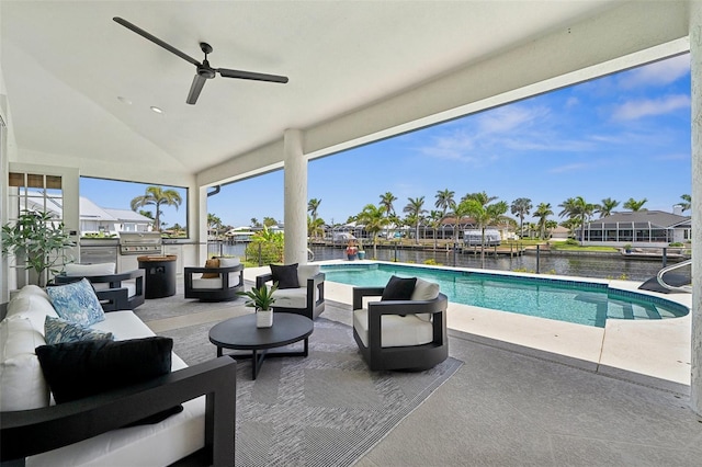 view of pool featuring an outdoor living space, a grill, a patio, and a fenced in pool