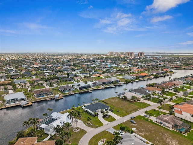 aerial view featuring a residential view and a water view