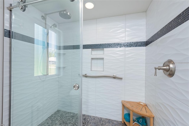 bathroom with a stall shower