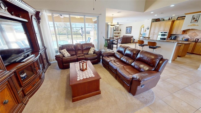 569 Royal Poinciana, Punta Gorda, FL 33955 - living area with light tile patterned floors, ceiling fan, and recessed lighting