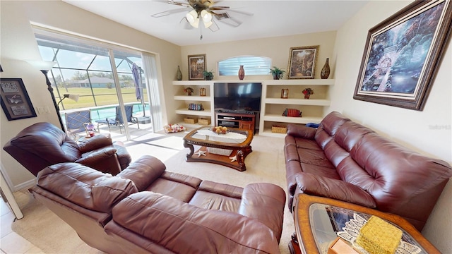569 Royal Poinciana, Punta Gorda, FL 33955 - carpeted living room featuring built in features and a ceiling fan