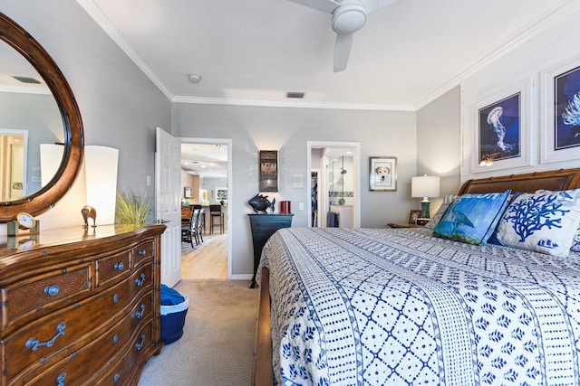 bedroom with crown molding, carpet, visible vents, and ceiling fan