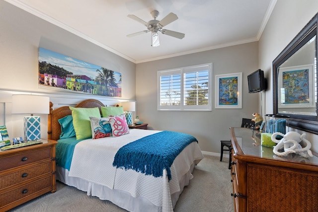 bedroom with carpet flooring, ceiling fan, crown molding, and baseboards