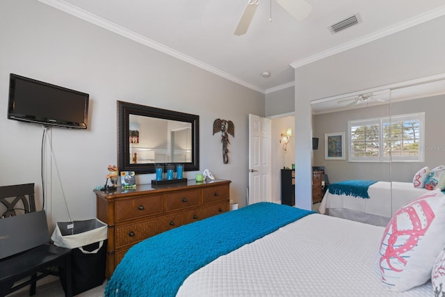 bedroom with a closet, visible vents, a ceiling fan, and ornamental molding