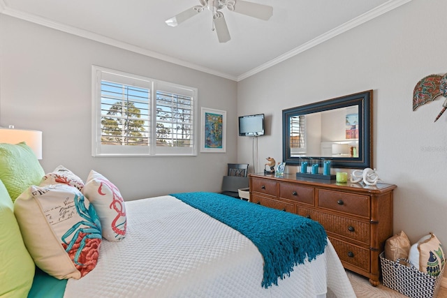 bedroom featuring multiple windows, crown molding, and ceiling fan