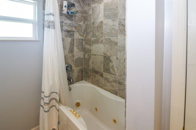 full bathroom featuring a combined bath / shower with jetted tub