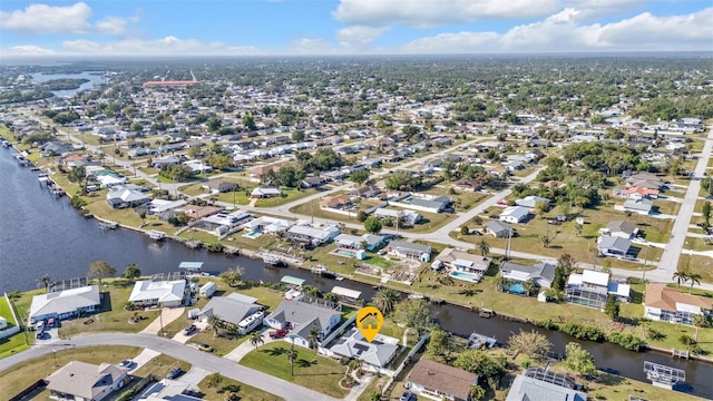 aerial view featuring a residential view and a water view