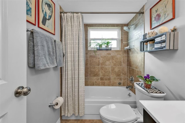 full bathroom featuring vanity, toilet, and shower / tub combo with curtain