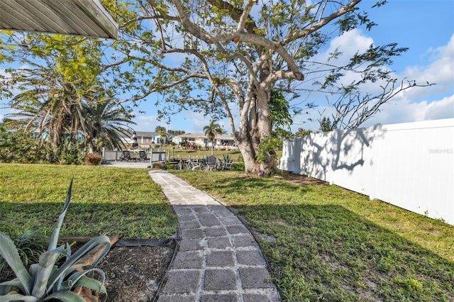 view of yard featuring fence