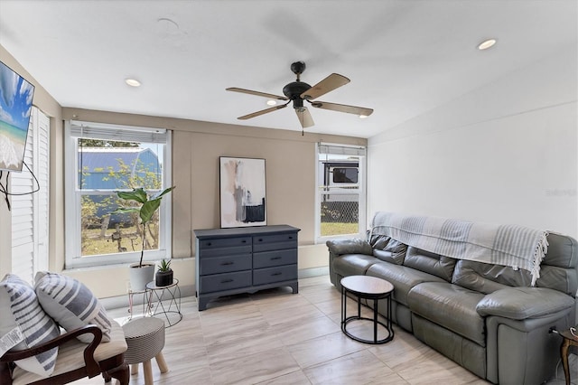 living area featuring recessed lighting, a ceiling fan, and vaulted ceiling