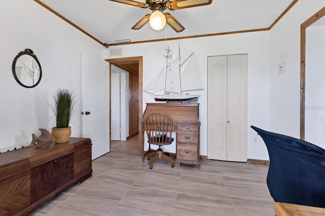 office area featuring crown molding, a ceiling fan, and visible vents