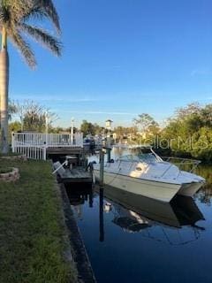 dock area featuring a water view