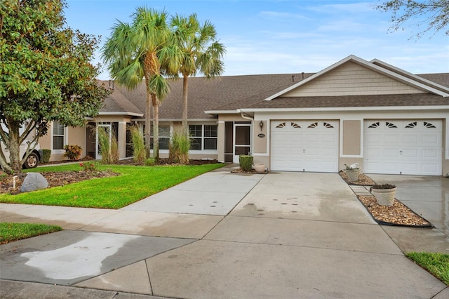 view of front of house featuring stucco siding, driveway, a shingled roof, and a garage