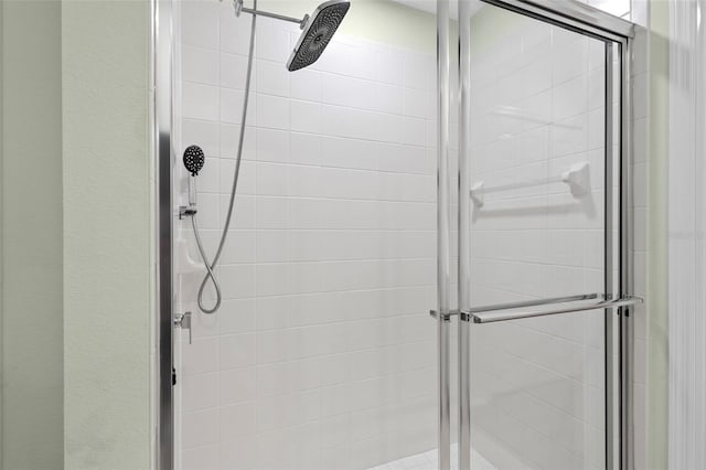 full bathroom featuring a stall shower