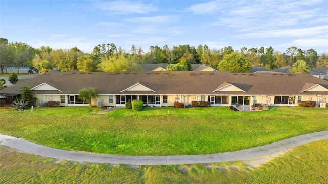 view of front of property with a front lawn