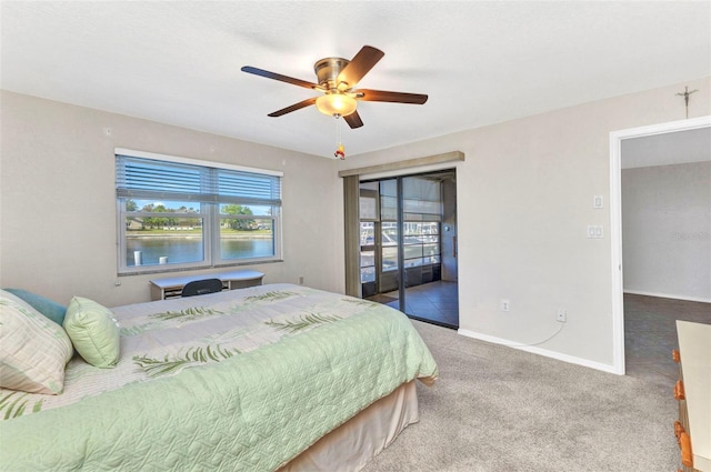 carpeted bedroom with baseboards and a ceiling fan