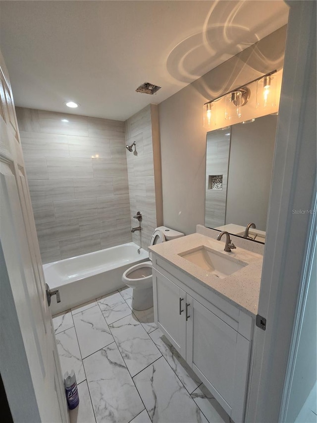 full bathroom featuring tub / shower combination, toilet, recessed lighting, marble finish floor, and vanity