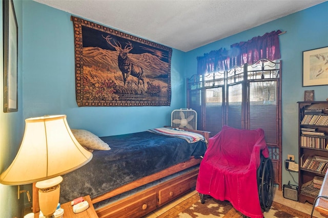 bedroom featuring a textured ceiling