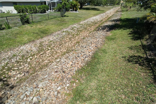 view of yard featuring fence