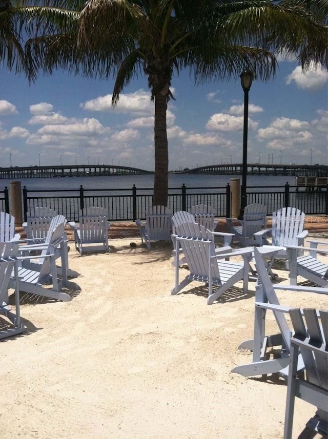 view of patio with a water view