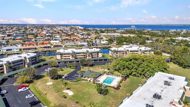 aerial view featuring a residential view and a water view