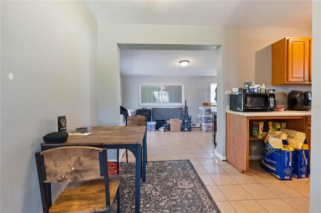 dining room with light tile patterned floors