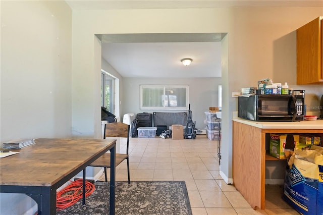 interior space featuring light tile patterned flooring