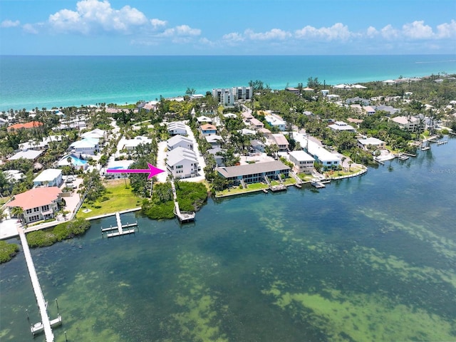 aerial view featuring a water view and a residential view