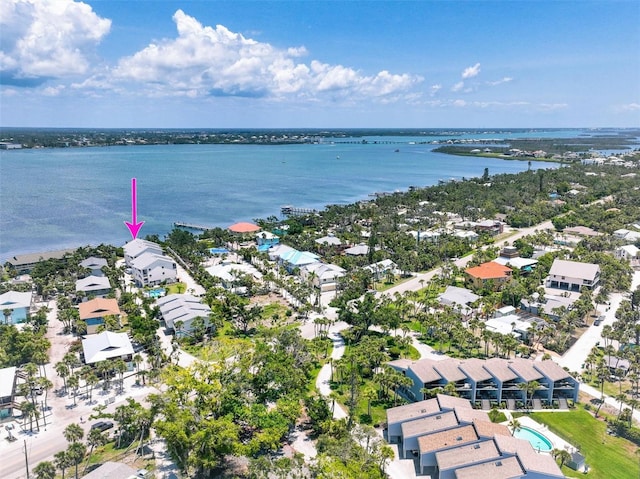 aerial view with a residential view and a water view