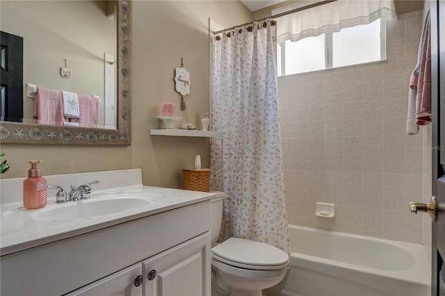 full bath with vanity, shower / bath combination with curtain, and toilet