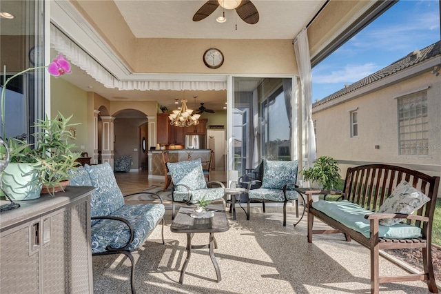 view of patio featuring a ceiling fan