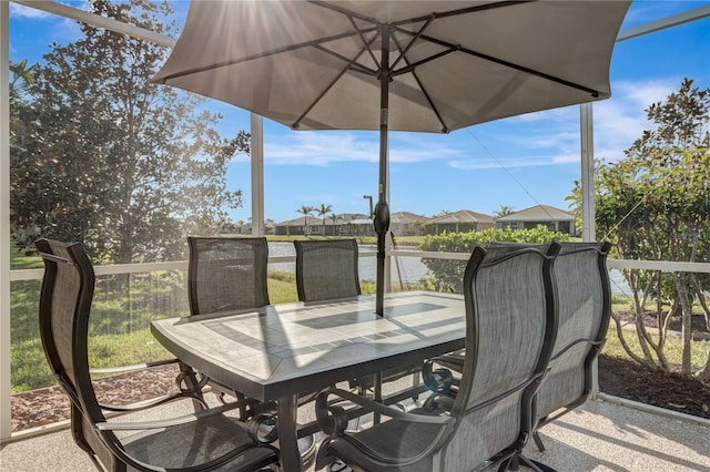 wooden deck featuring outdoor dining area