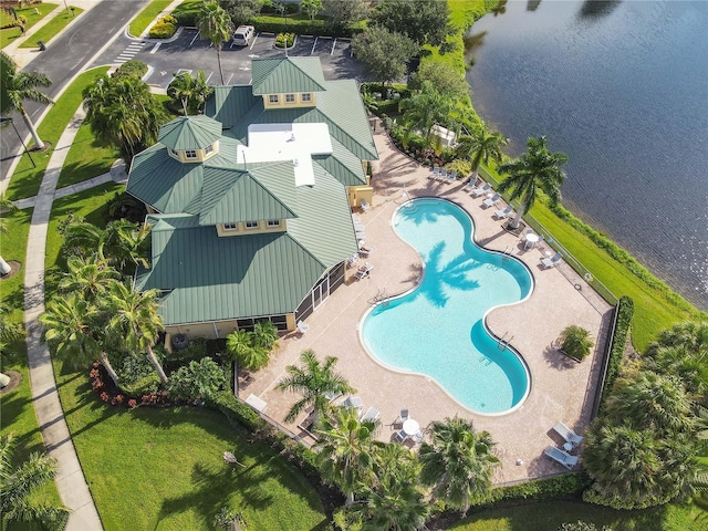 birds eye view of property featuring a water view