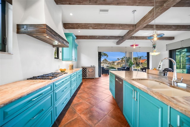 1111 San Mateo Dr, Punta Gorda, FL 33950 - kitchen featuring visible vents, blue cabinetry, ventilation hood, stainless steel appliances, and a sink