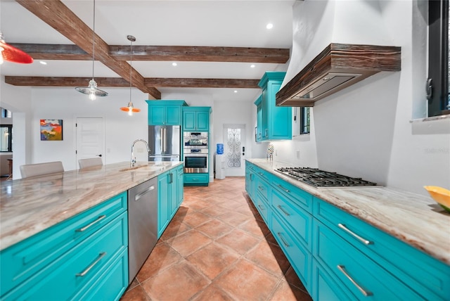 1111 San Mateo Dr, Punta Gorda, FL 33950 - kitchen with light stone counters, appliances with stainless steel finishes, blue cabinets, and a sink