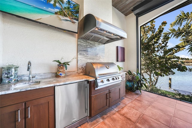 1111 San Mateo Dr, Punta Gorda, FL 33950 - view of patio featuring grilling area, exterior kitchen, and a sink