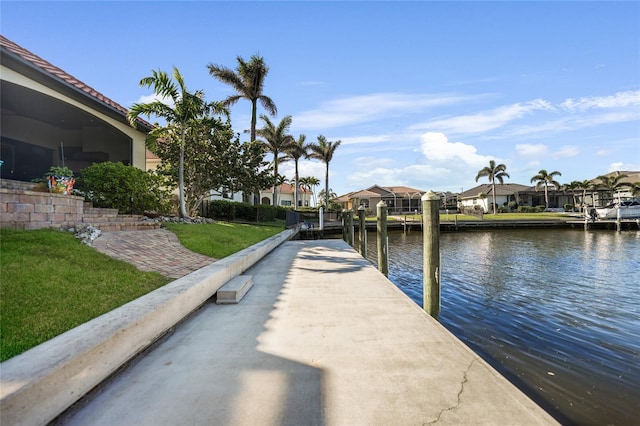 1111 San Mateo Dr, Punta Gorda, FL 33950 - dock area featuring a yard, a residential view, and a water view