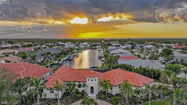 1111 San Mateo Dr, Punta Gorda, FL 33950 - aerial view at dusk with a residential view and a water view