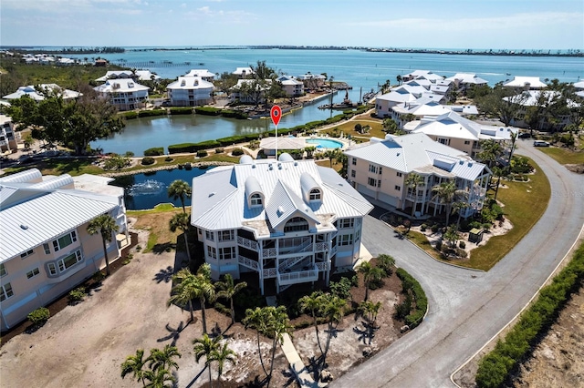 drone / aerial view with a water view